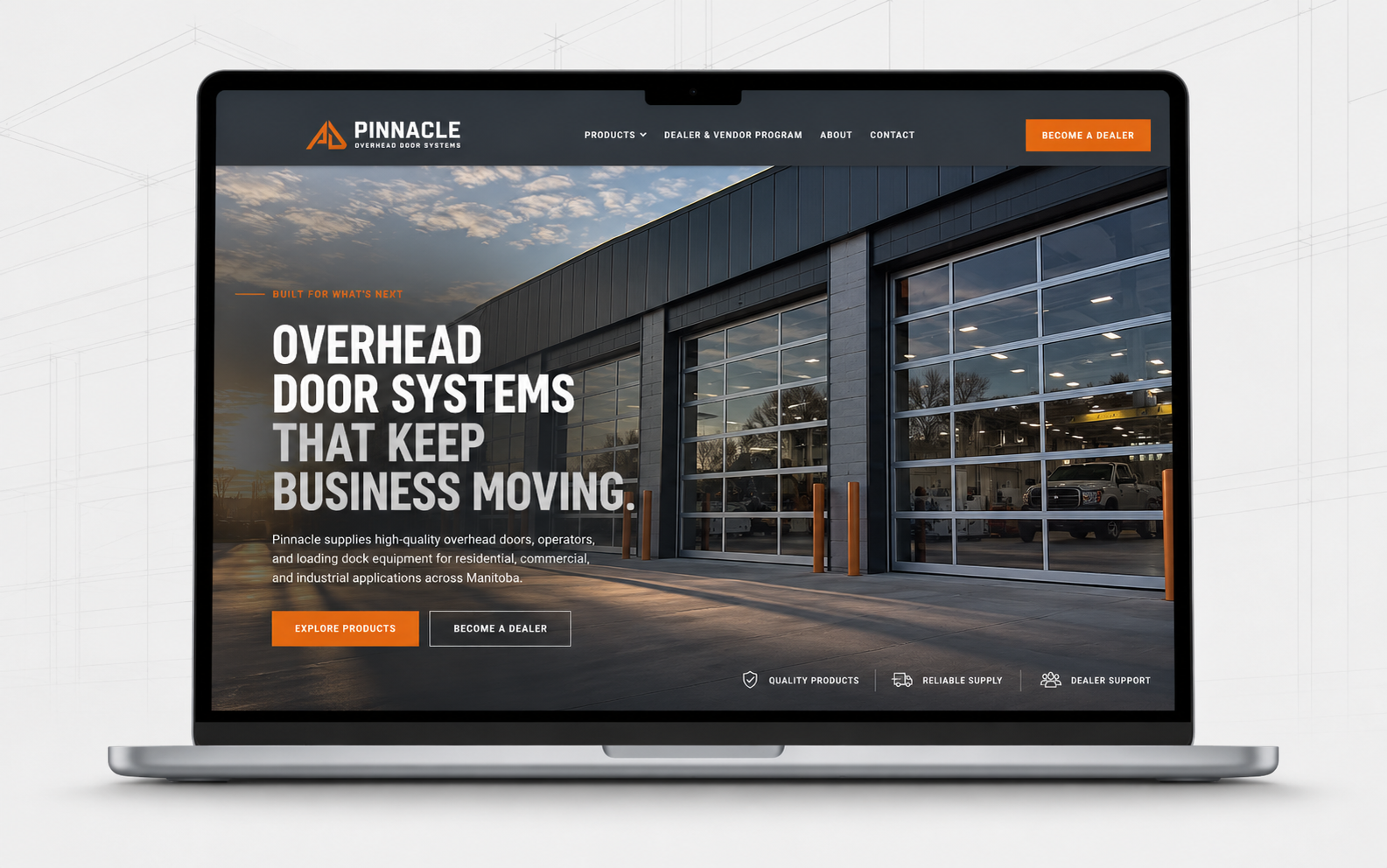 Pinnacle Overhead Door Systems website shown on a laptop